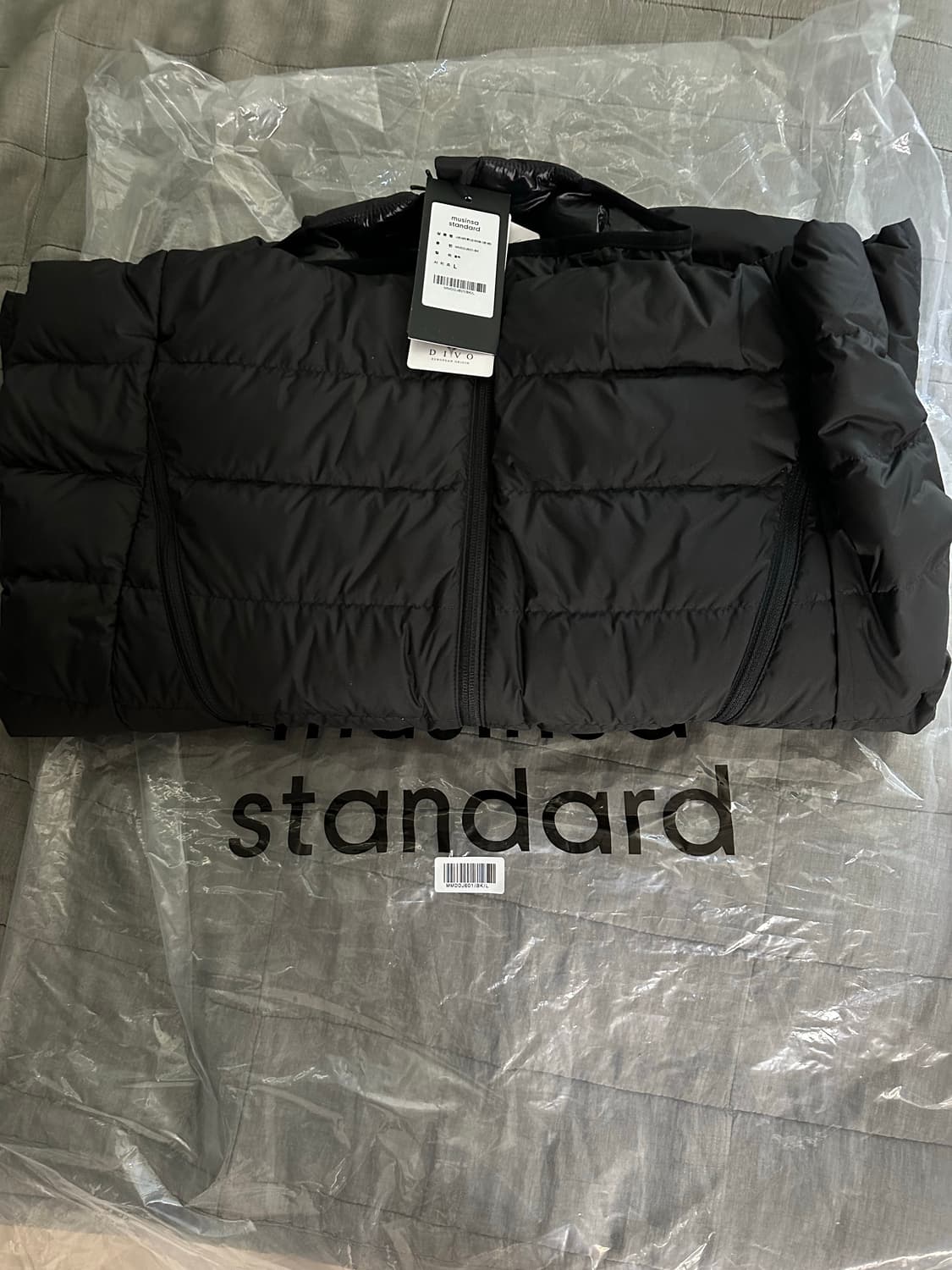 무신사 스탠다드 시티 레저 후디드 라이트 다운 재킷 블랙 L사이즈 상품이미지1
