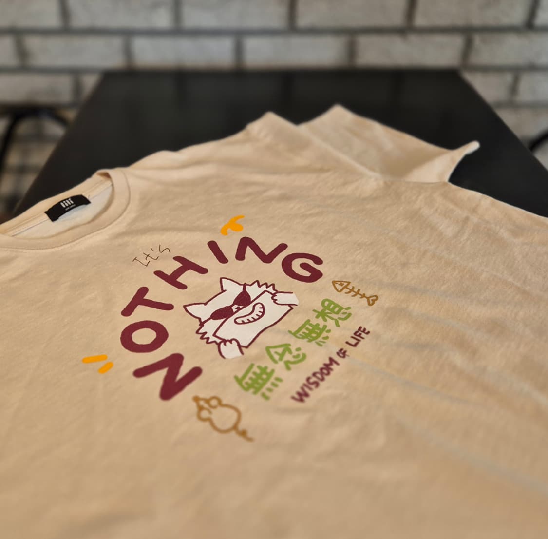 힙캣 NOTHING 그래픽 오버핏 티셔츠 (크림) 상품이미지1