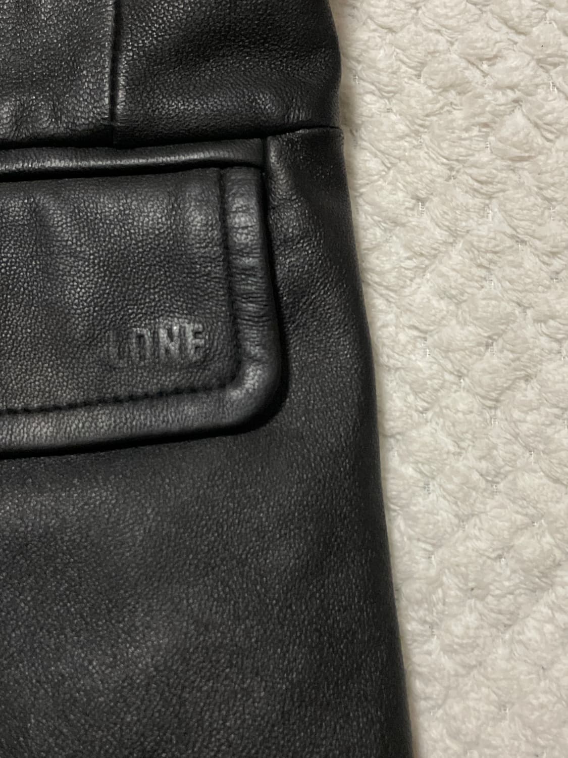 JUNN.J 정욱준 LONE 웨스턴 무드 램스킨 양가죽 레더 자켓 상품이미지7