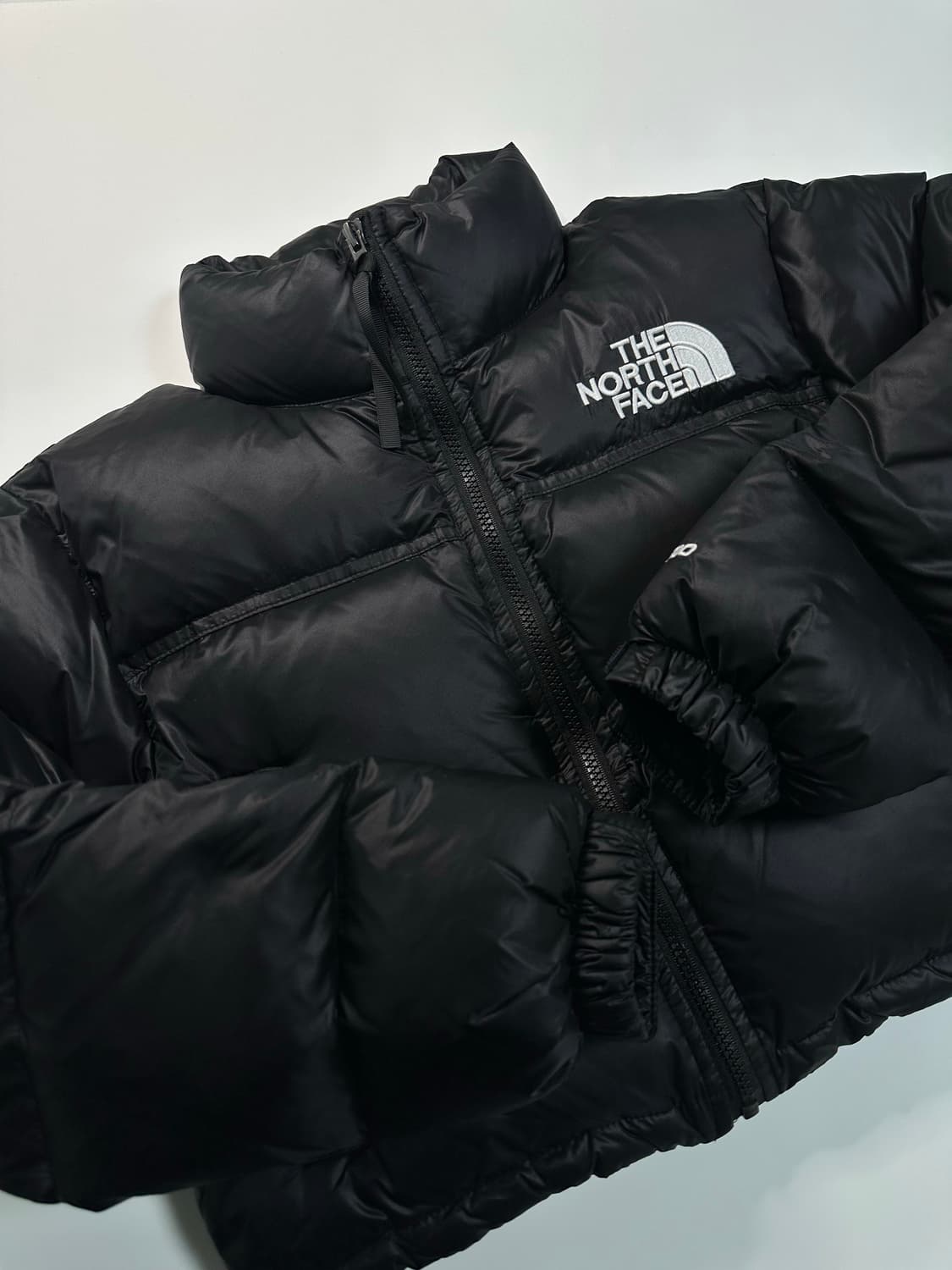 노스페이스 눕시 크롭 700 블랙 상품이미지1