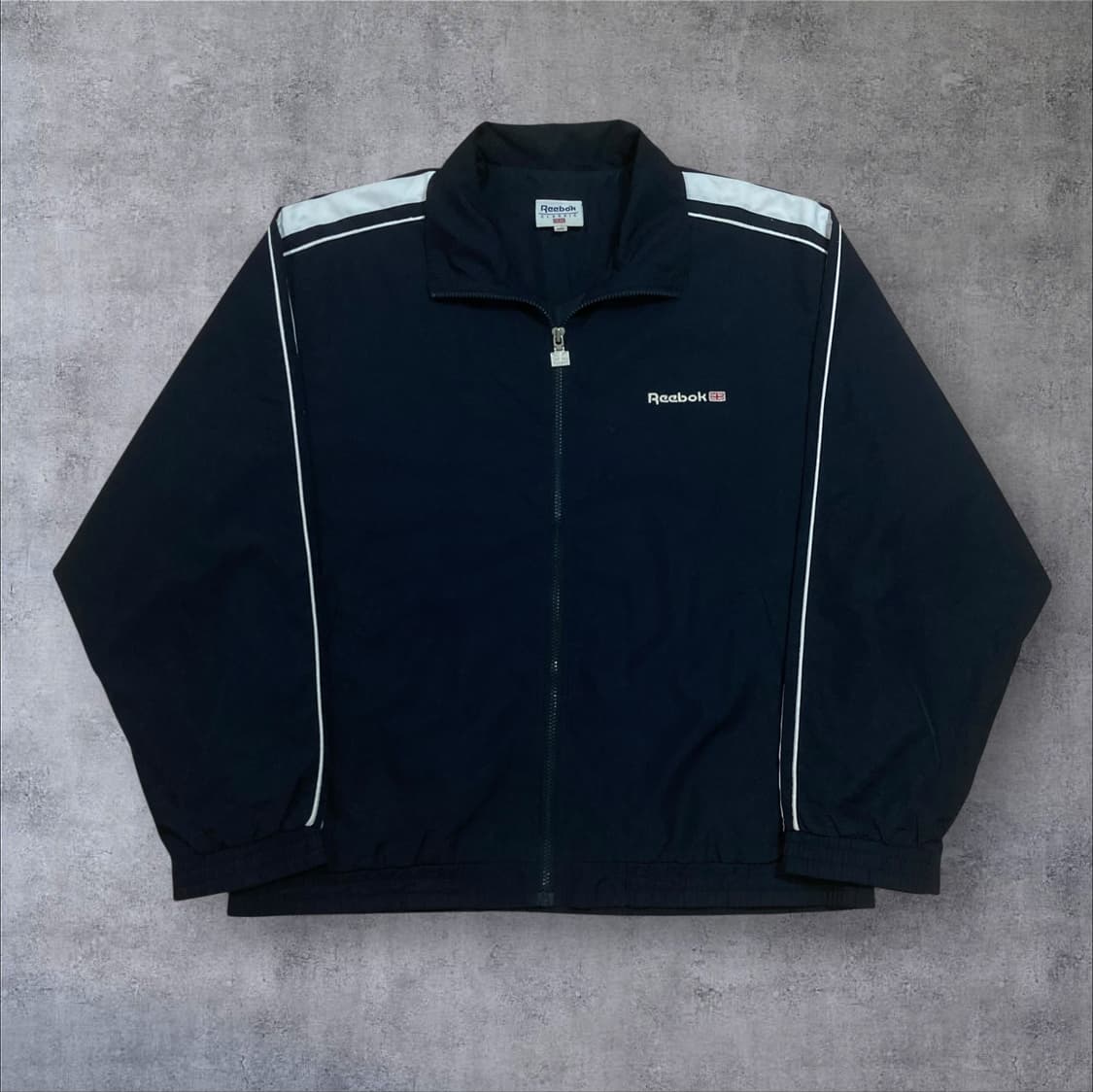 리복 올드스쿨 스몰 로고 네이비 바람막이 상품이미지1