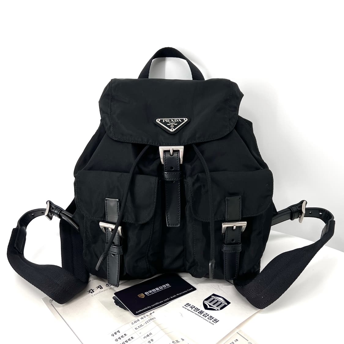 [감정완료] 프라다 삼각로고 나일론 백팩 블랙 스몰 상품이미지1