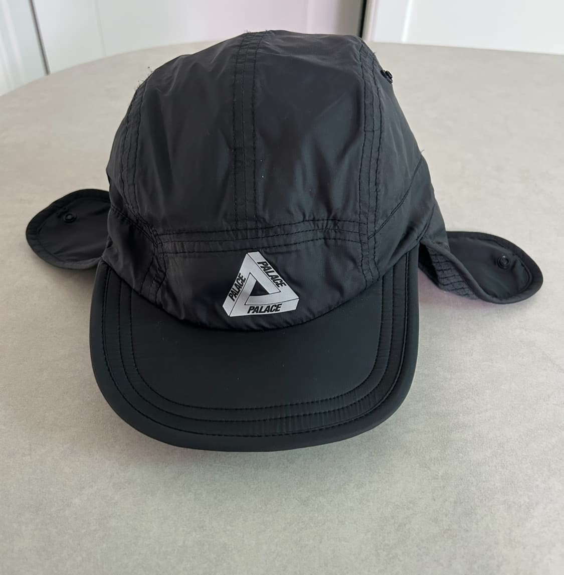 팔라스 그리드 플리스 리버시블 이어플랫 햇 상품이미지1