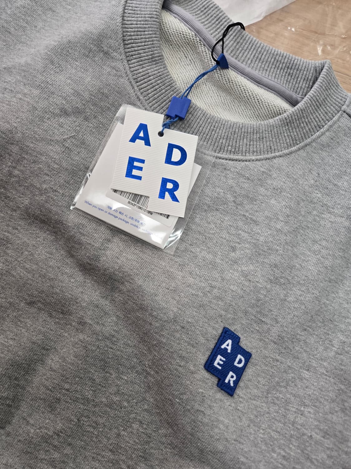 아더에러 그레이(사이즈L) 맨투맨 스웻셔츠 팝니다 상품이미지1