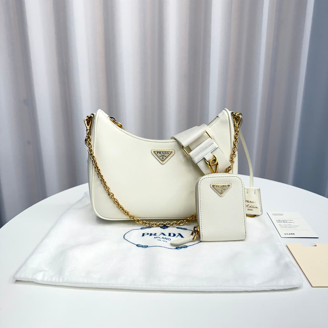 [정품] 프라다 사피아노 레더 체인 금장 크로스 호보백 상품이미지1