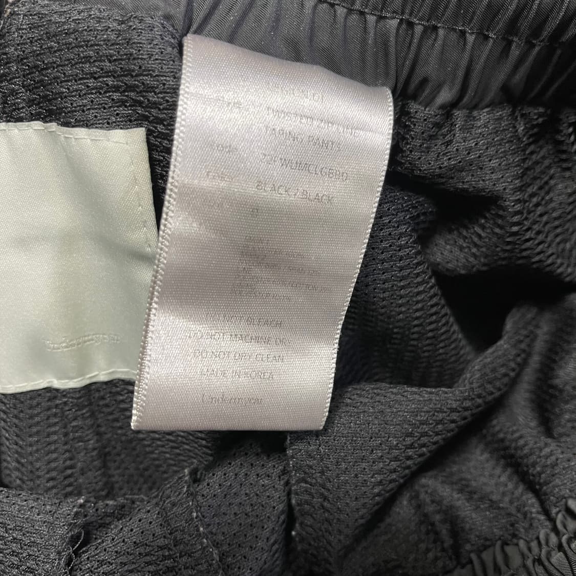 [0] 언더마이카 리전.01 트위스트 지퍼 라인 테이핑 팬츠 블랙 상품이미지8