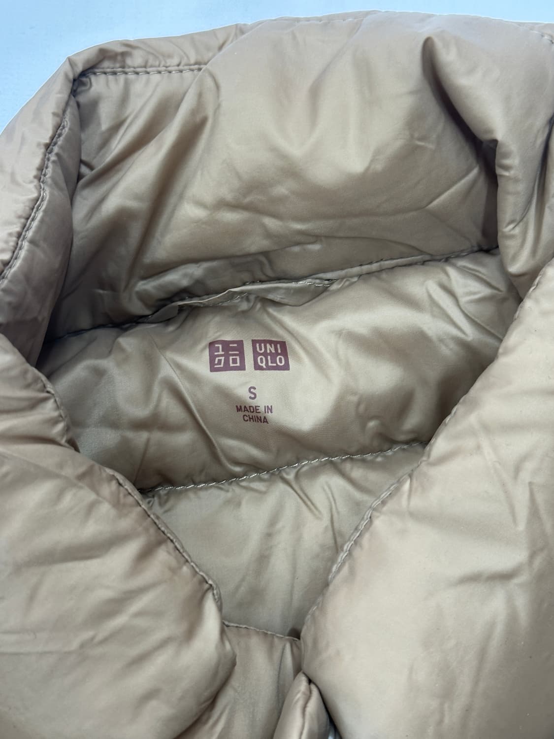 재팬 유니클로 베이지 사와코 케이프st 경량패딩 7부 러블리 다운 히피 상품이미지5