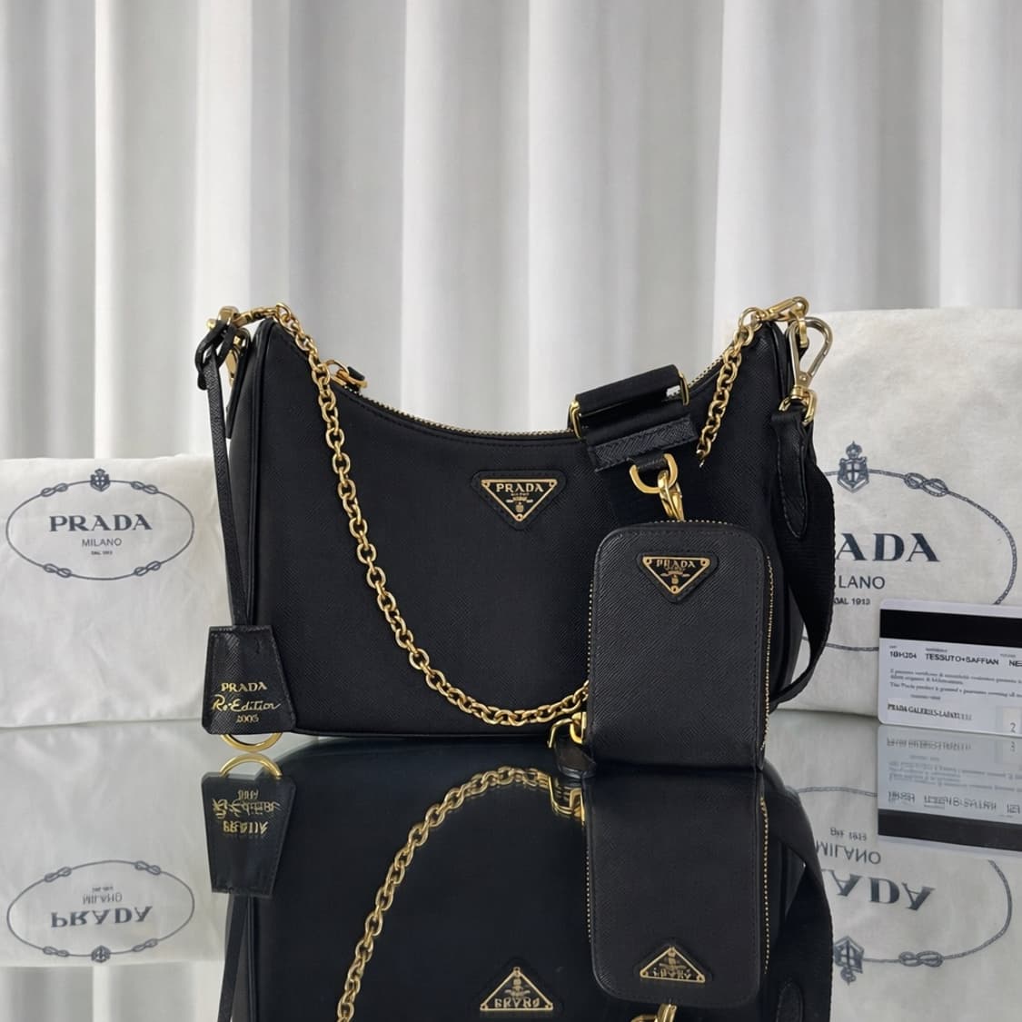 프라다 리에디션 사피아노 레더 테수토 호보백 블랙 골드 상품이미지1
