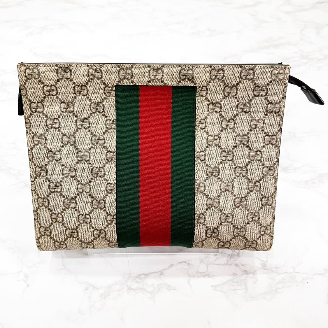 구찌 GG 수프림 웹 클러치 상품이미지1