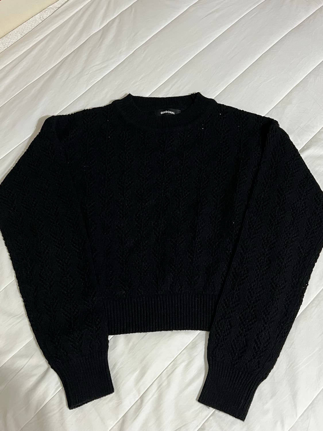 다이애그널 레이스펀칭 니트 상품이미지1