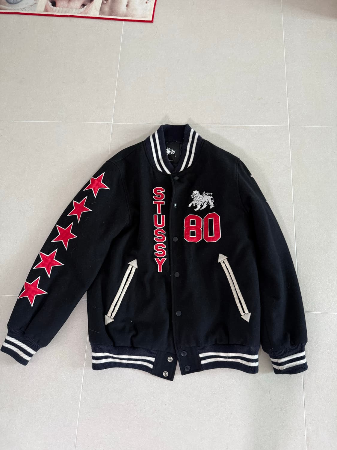 스투시 라이온 바시티 자켓 상품이미지1