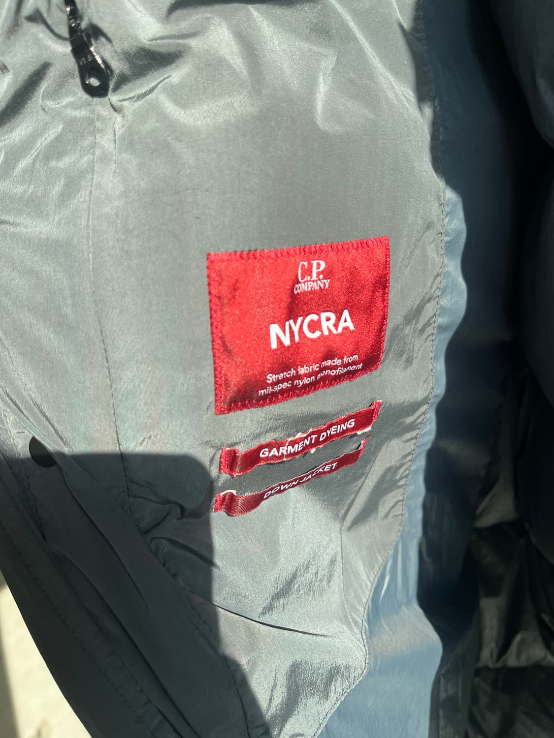 새상품(XXL)씨피컴퍼니 나이크라 후드 롱패딩 다크그레이 상품이미지8