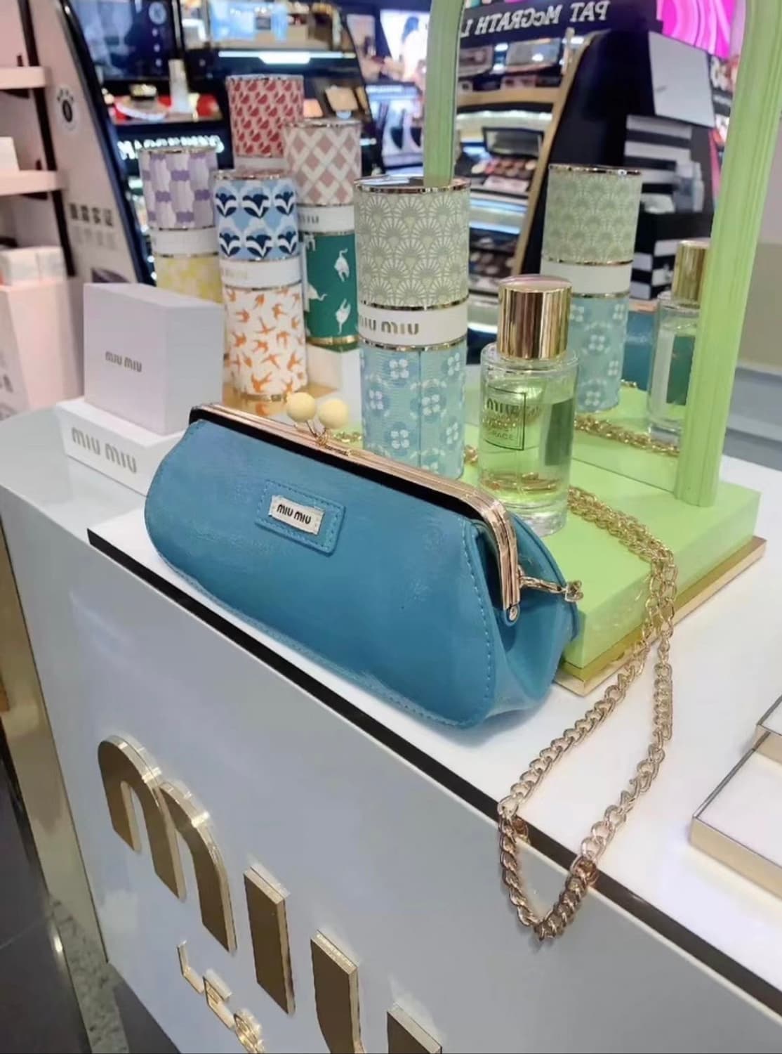 미우미우 캔디 체인 클러치백 상품이미지1