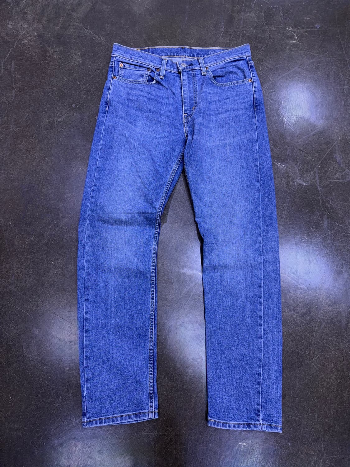 리바이스 502 테이퍼드핏 기능성 코튼 빈티지 중청 데님팬츠 32 상품이미지1