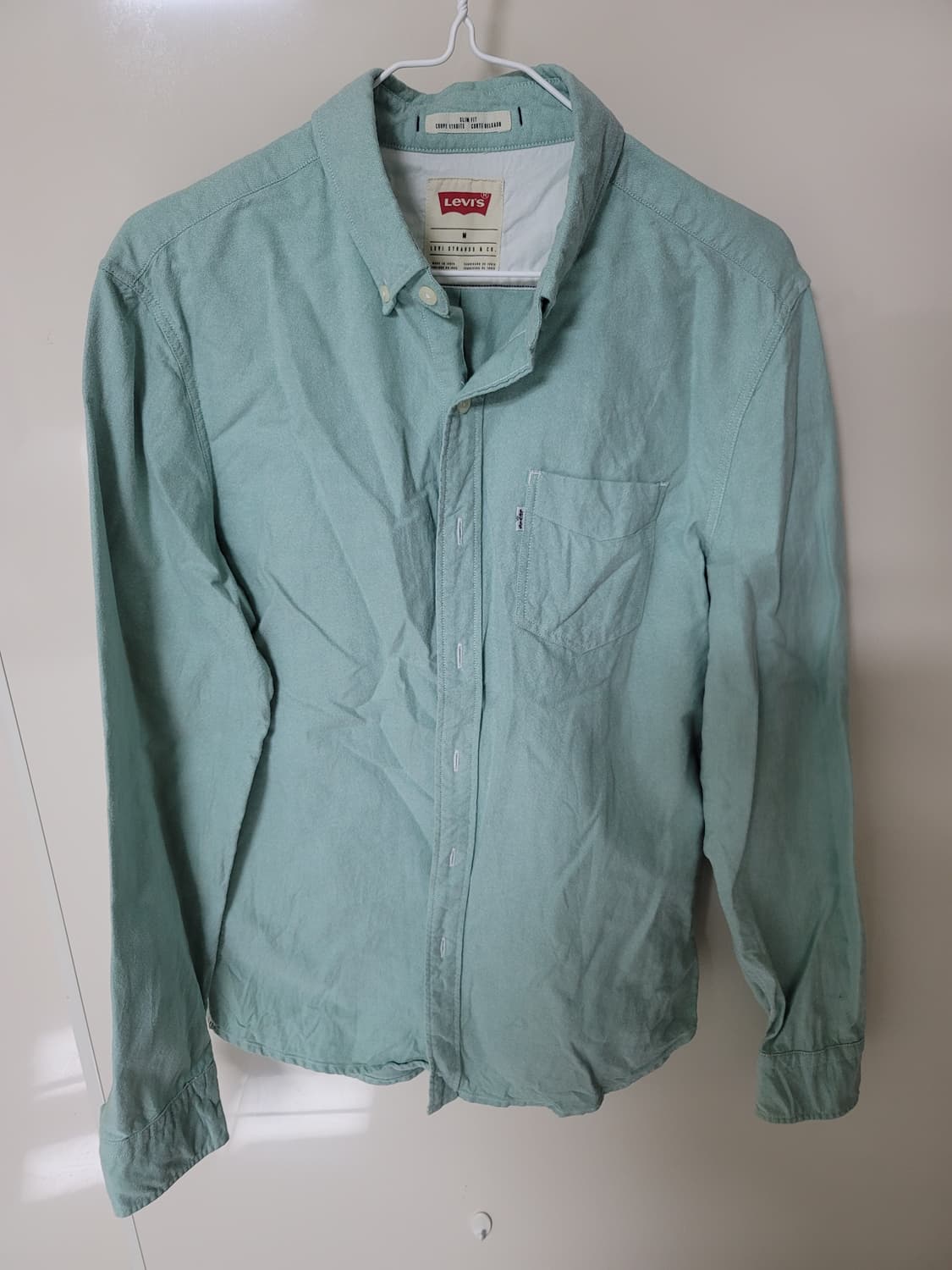 리바이스 연두색 셔츠 95사이즈 구김있음

 상품이미지1