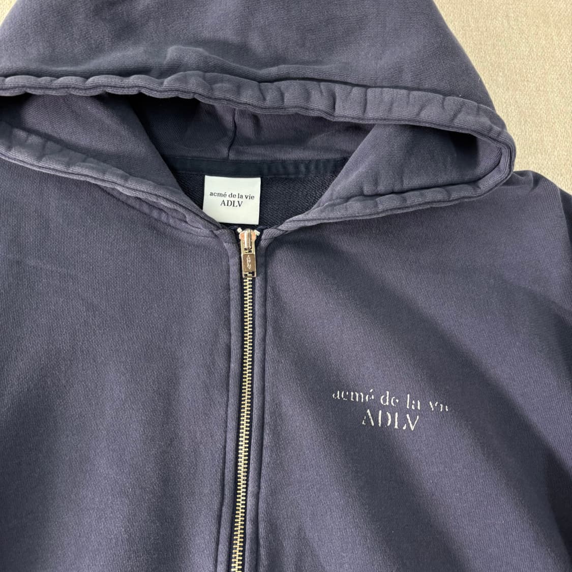 105 아크메드라비 백로고 후드집업 상품이미지3