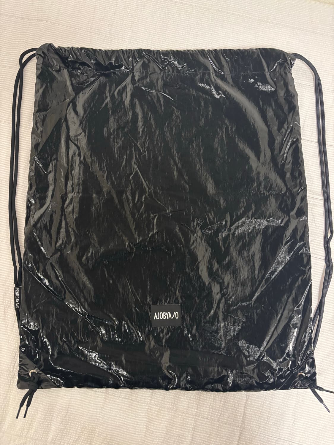 아조바이아조 토탈 로고 메탈 드로우스트링 백 블랙 상품이미지3