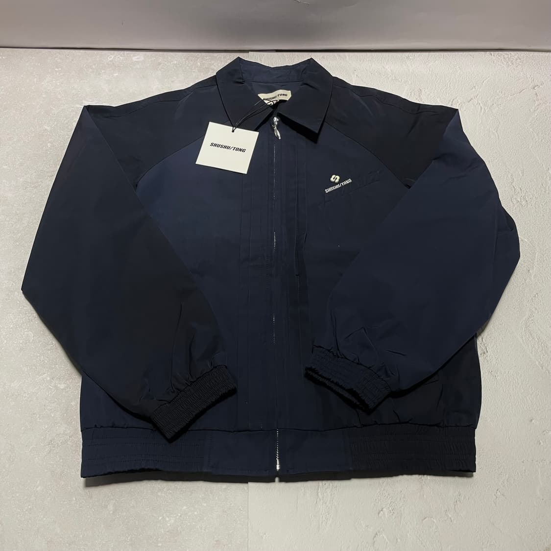 [6] 슈슈통 25AW 네이비 스포츠 자켓 상품이미지1