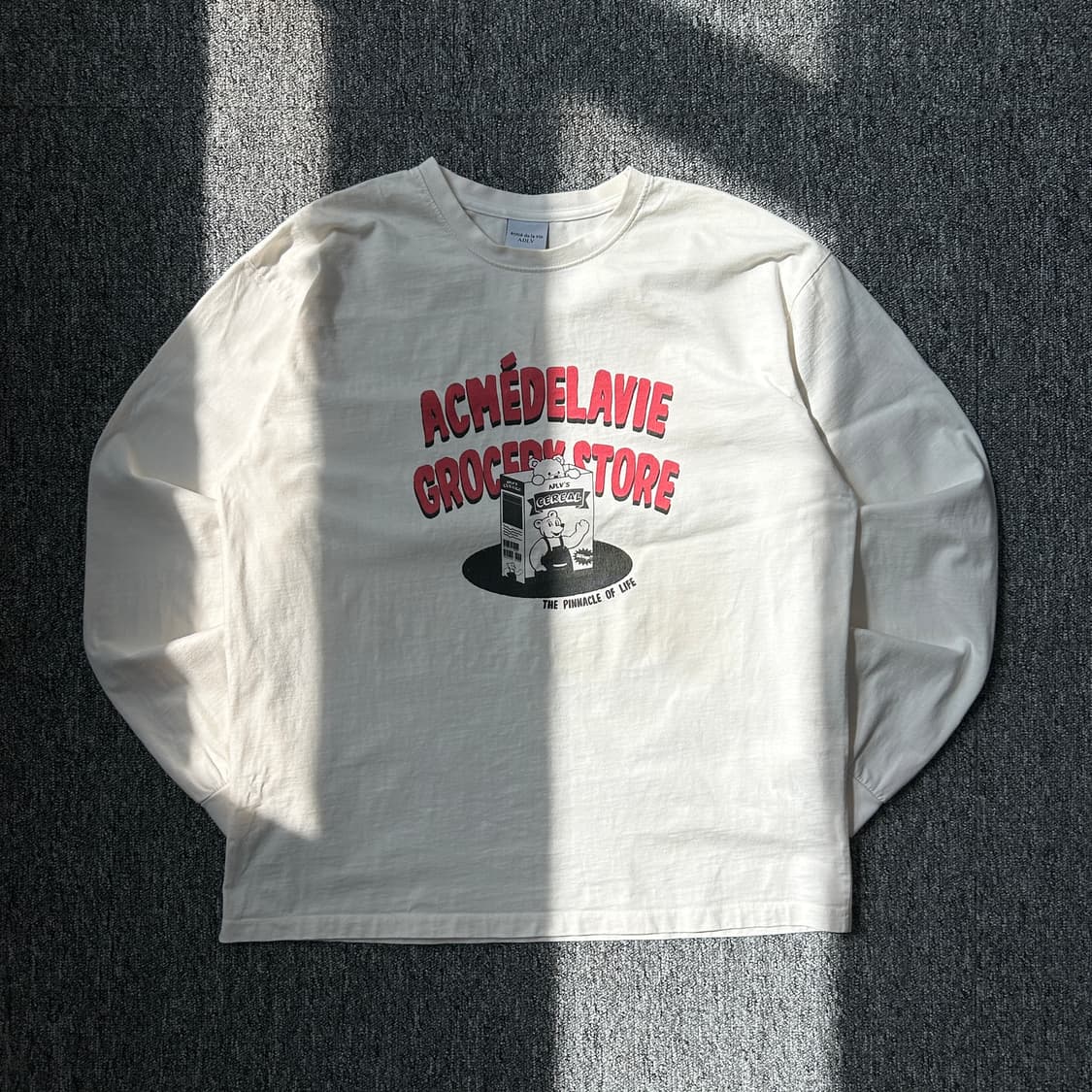 아크메드라비 아이보리 긴팔티셔츠 상품이미지1