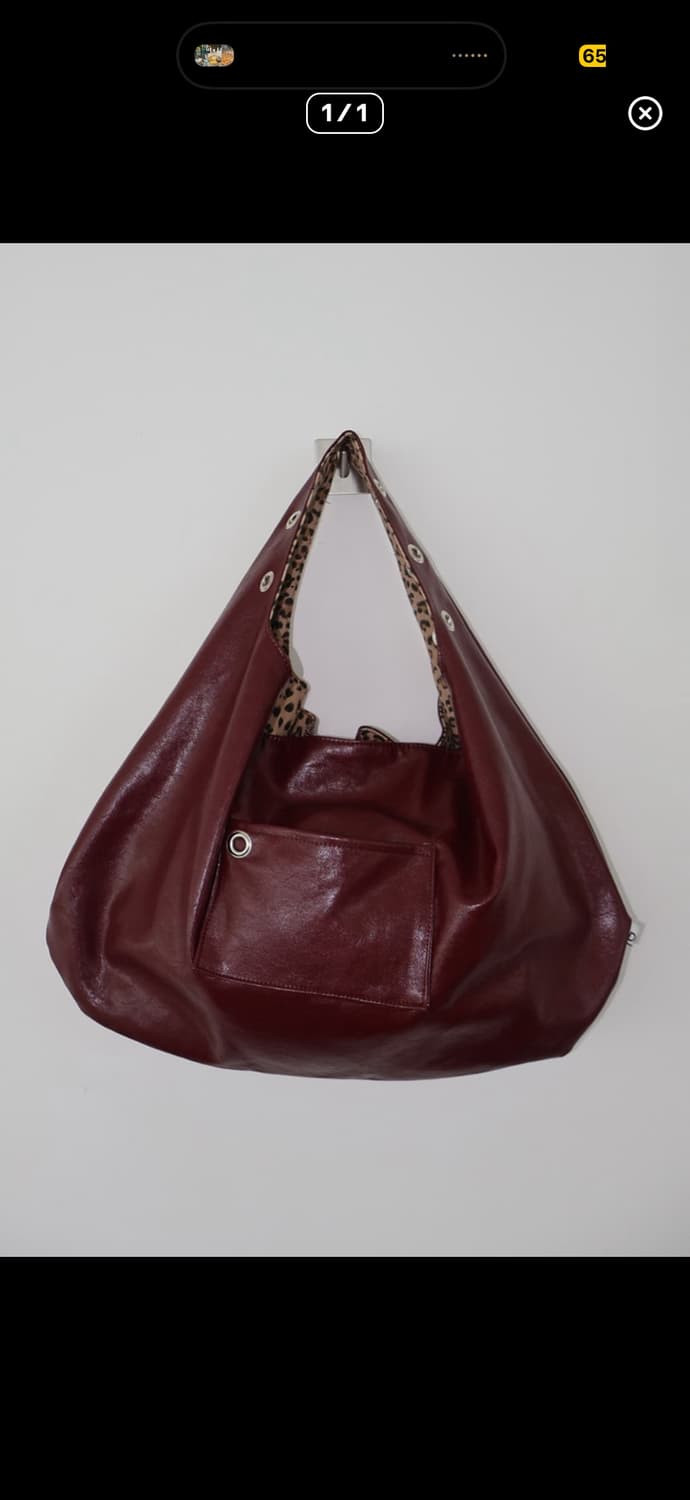 뎁크 아일렛 레더 백 상품이미지1