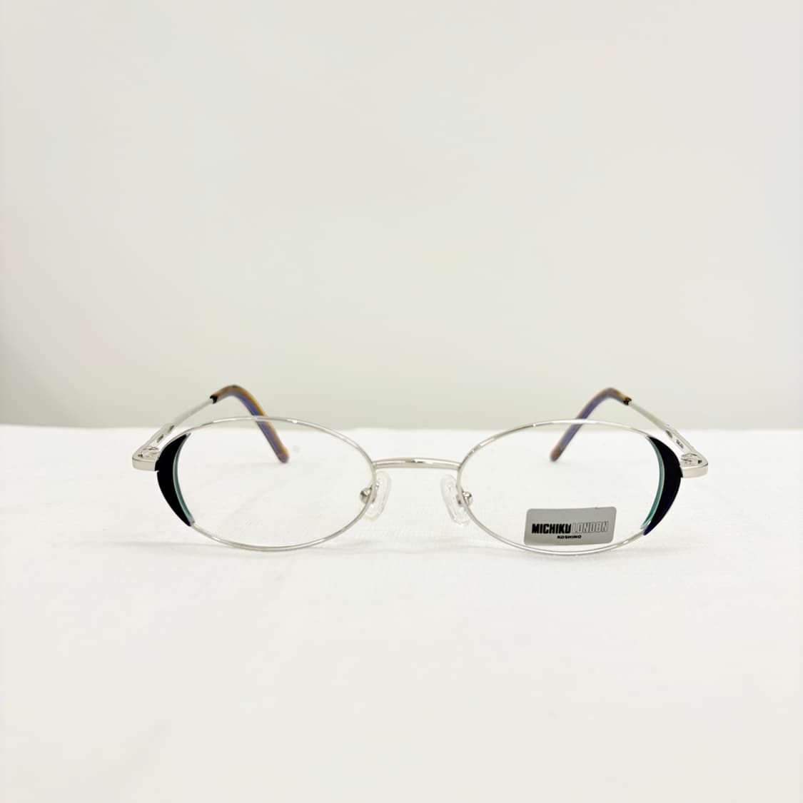 MICHIKO LONDON 미치코런던 실버 오벌 메탈테 상품이미지1