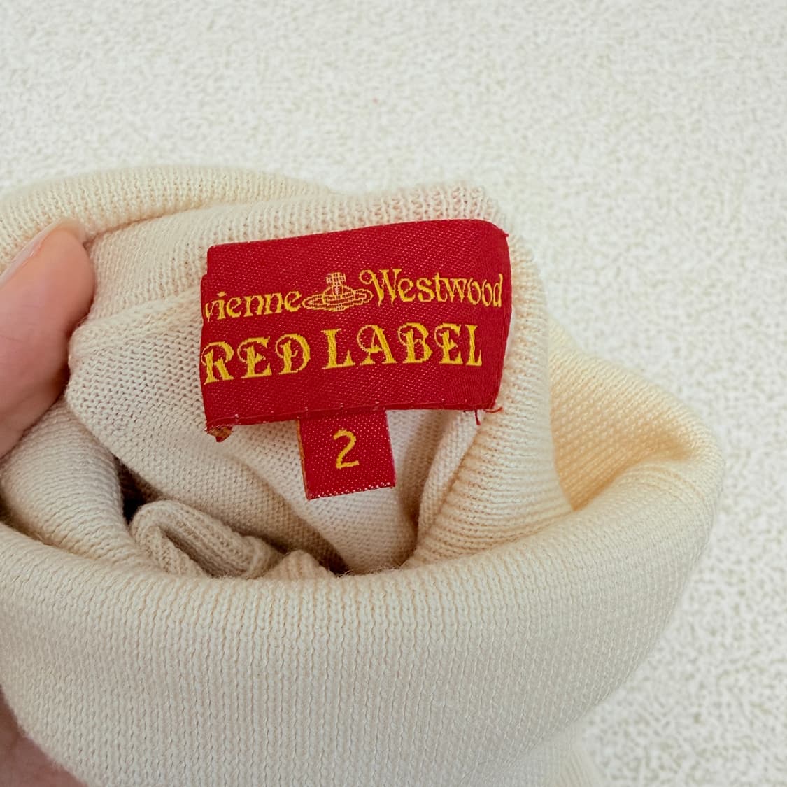 비비안웨스트우드 하이넥 베스트 니트 아이보리 상품이미지8