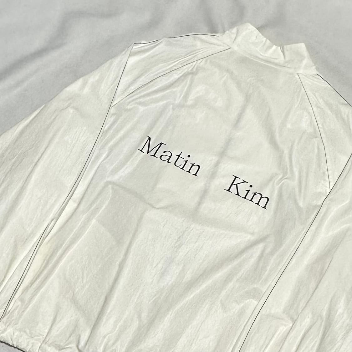 F 마뗑킴 로고 코팅 화이트 바람막이 상품이미지1