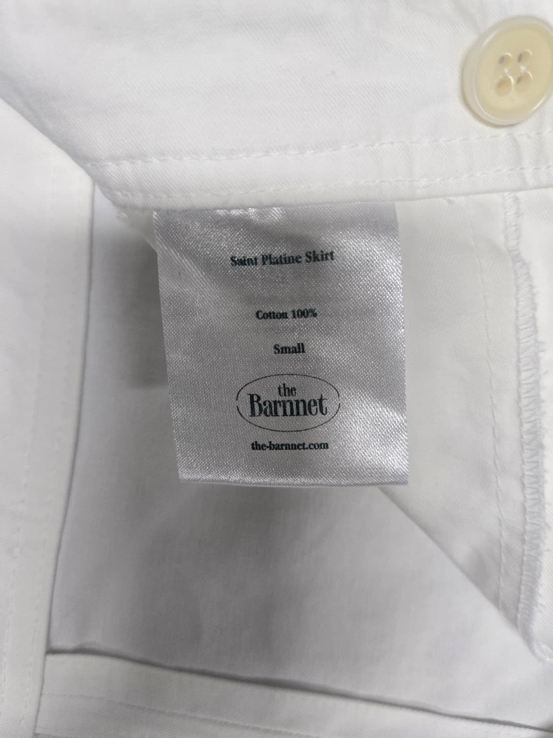 더바넷 화이트 금장 버튼 A라인 스커트 상품이미지7