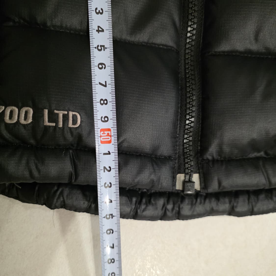 노스페이스 700필 패딩 조끼 베이지/블랙 XS 상품이미지9
