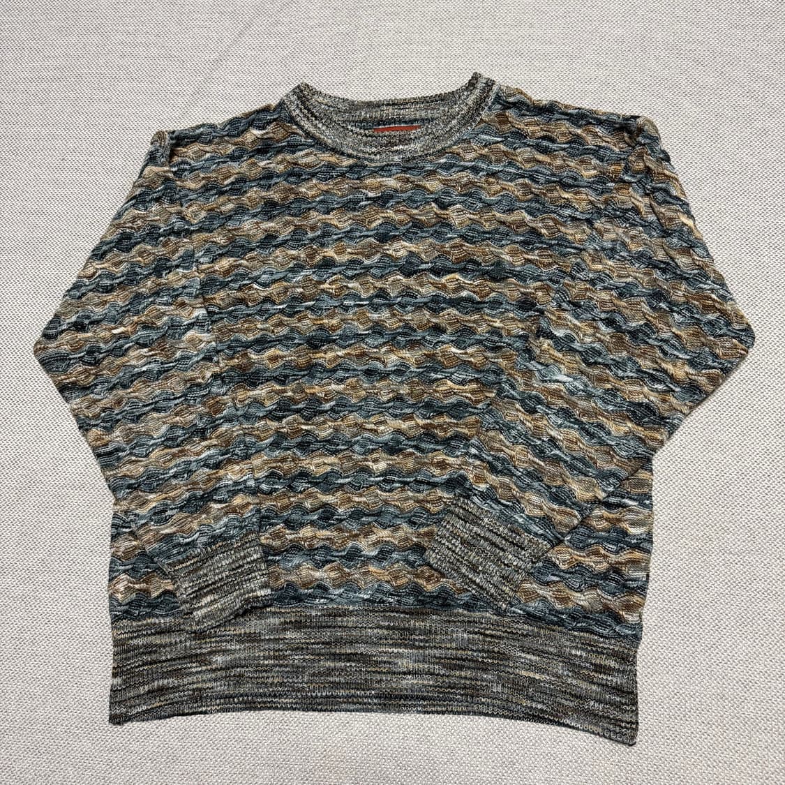 미쏘니 패턴 케이블 니트 스웨터 상품이미지1