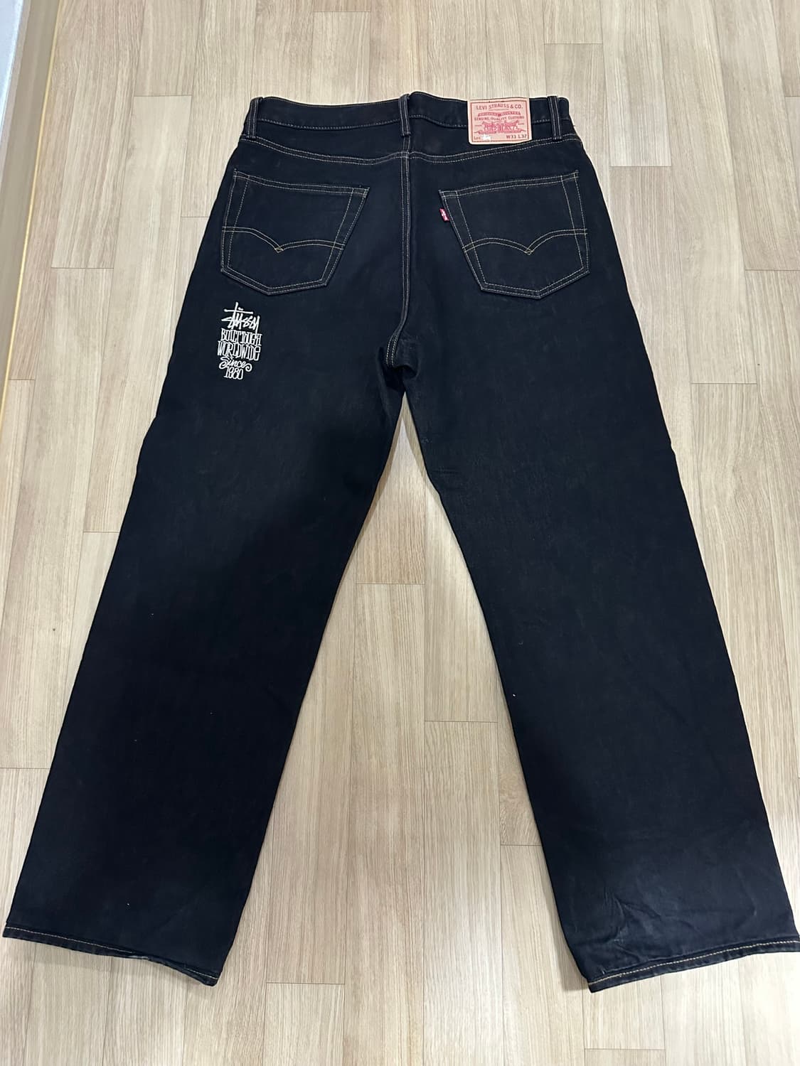 스투시 x 리바이스 크리스피 린스 568 진 블랙 상품이미지1