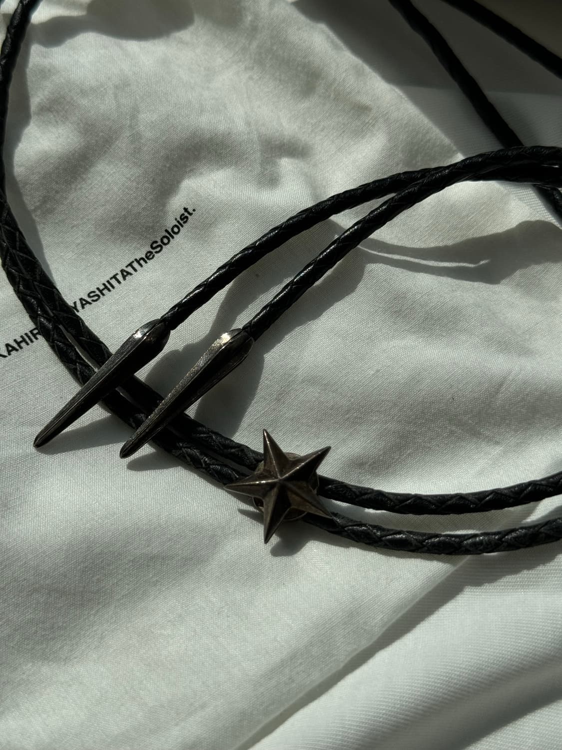 솔로이스트 루프타이 블랙색상 구매합니다 상품이미지1