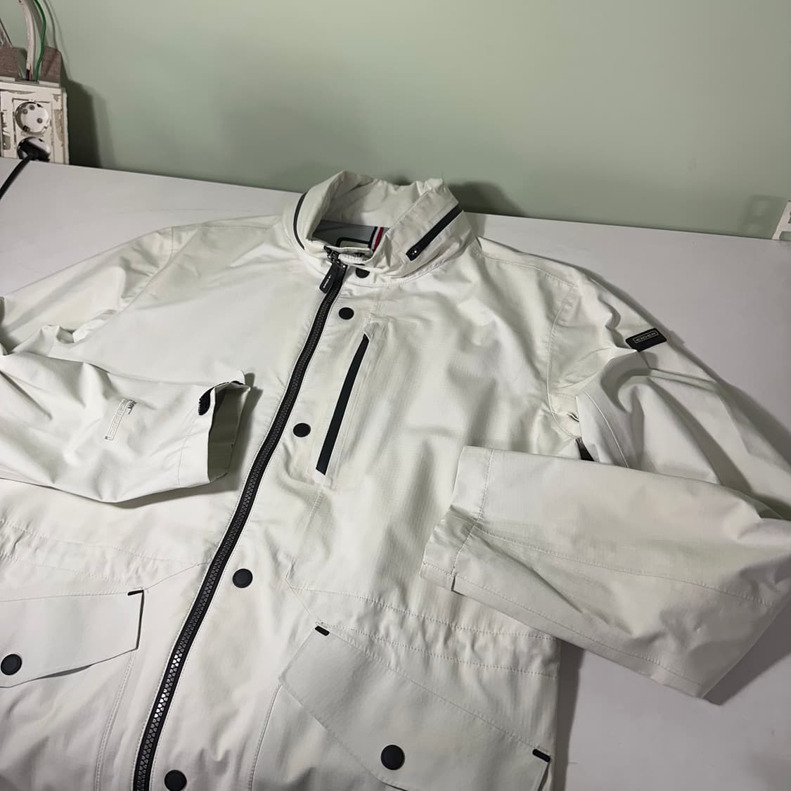 M-L 아이더 크림아이보리 허리스트링 히든후드 나일론자켓 상품이미지1