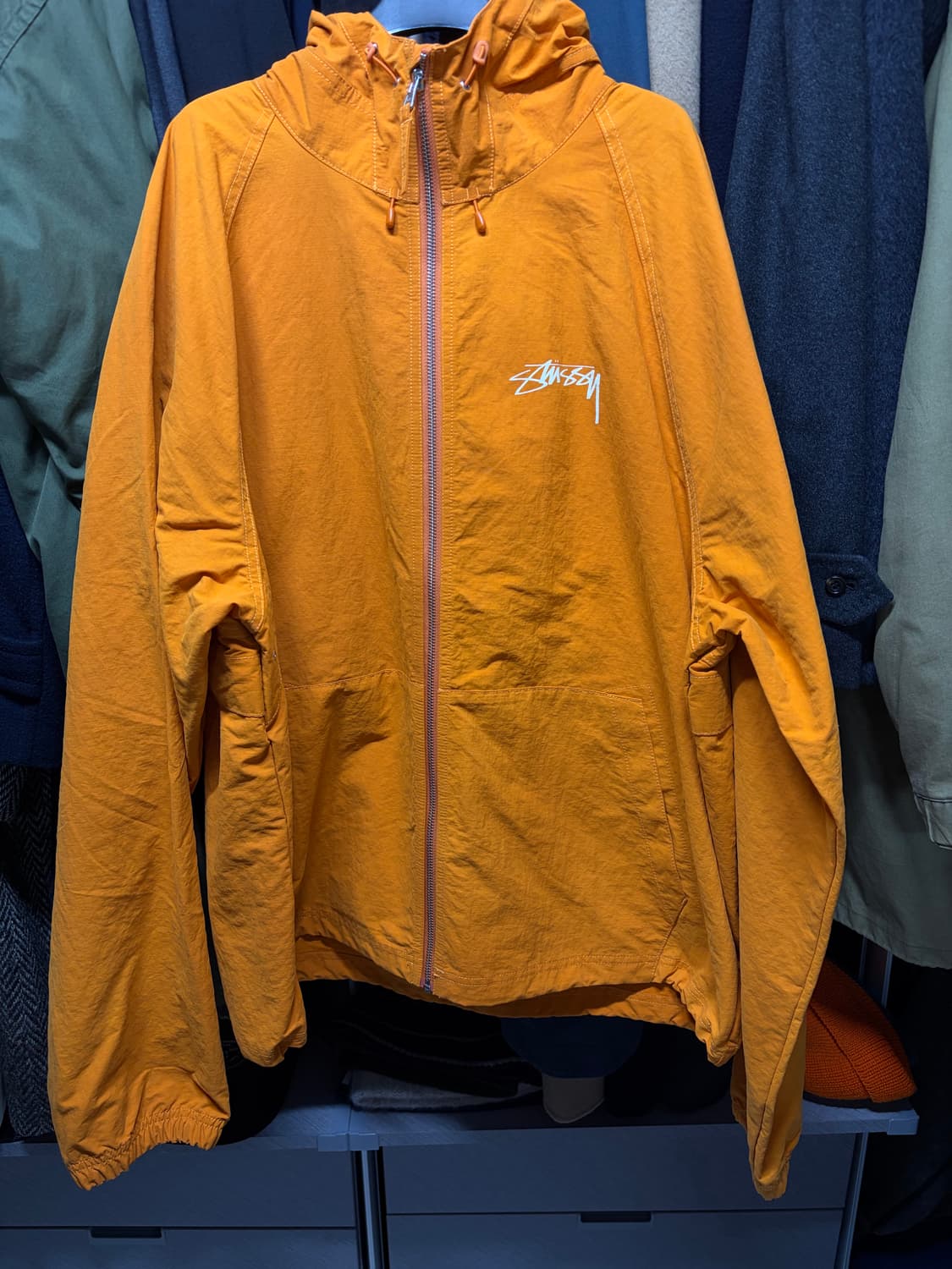 스투시 비치쉘 자켓 오랜지 컬러 XL 사이즈 판매합니다. 상품이미지1