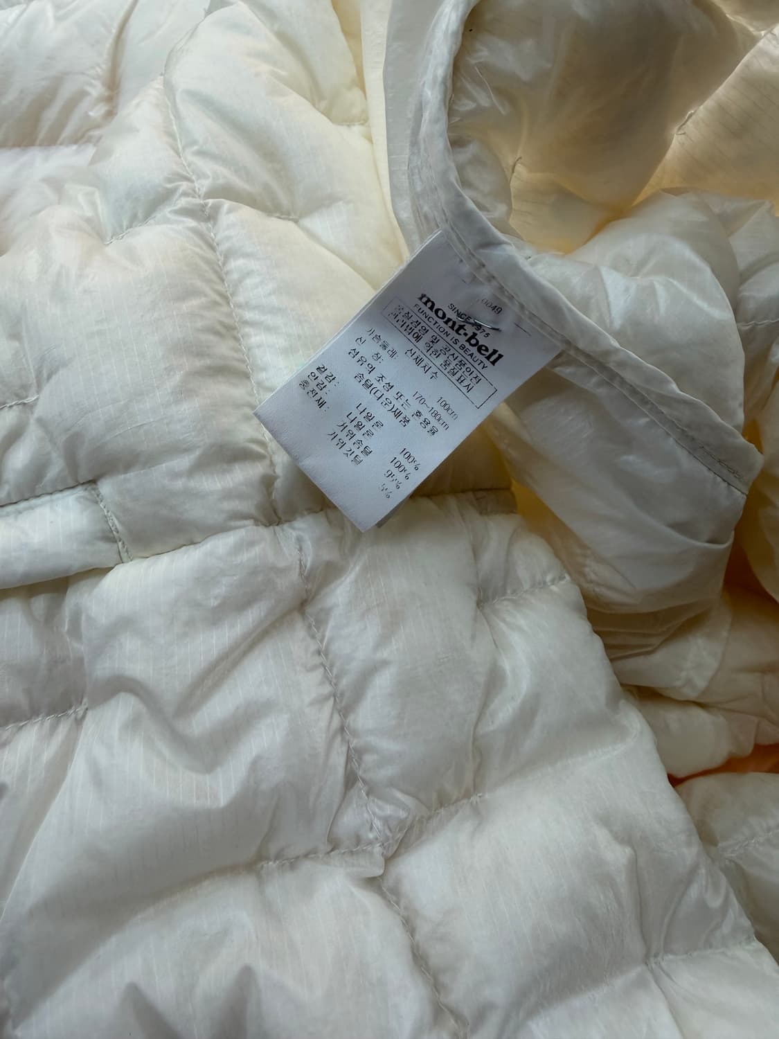 L/ 몽벨 13FW 플라즈마 EX1000 경량 패딩 크림 상품이미지10