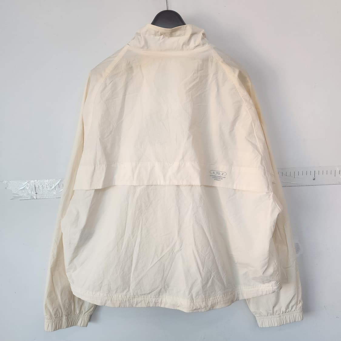 다이나핏 아이보리색 포켓 바람막이 점퍼 상품이미지9