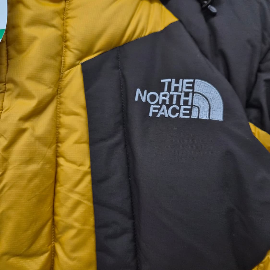 노스페이스 700 구스다운 옐로우/브라운 배색 눕시 패딩 남녀공용 M 상품이미지3