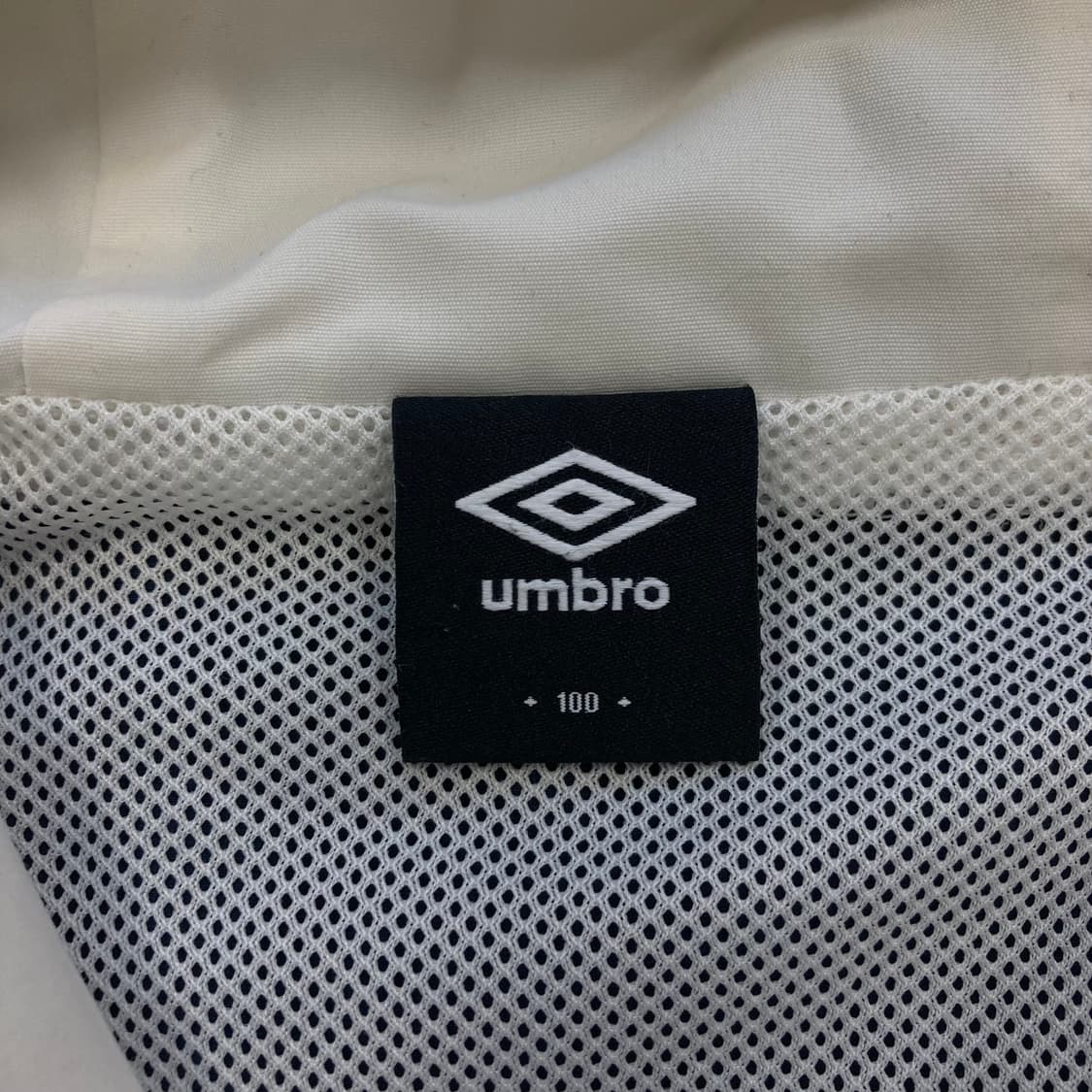 엄브로 스펠아웃 로고 믹스 컬러 바람막이 아노락 상품이미지5