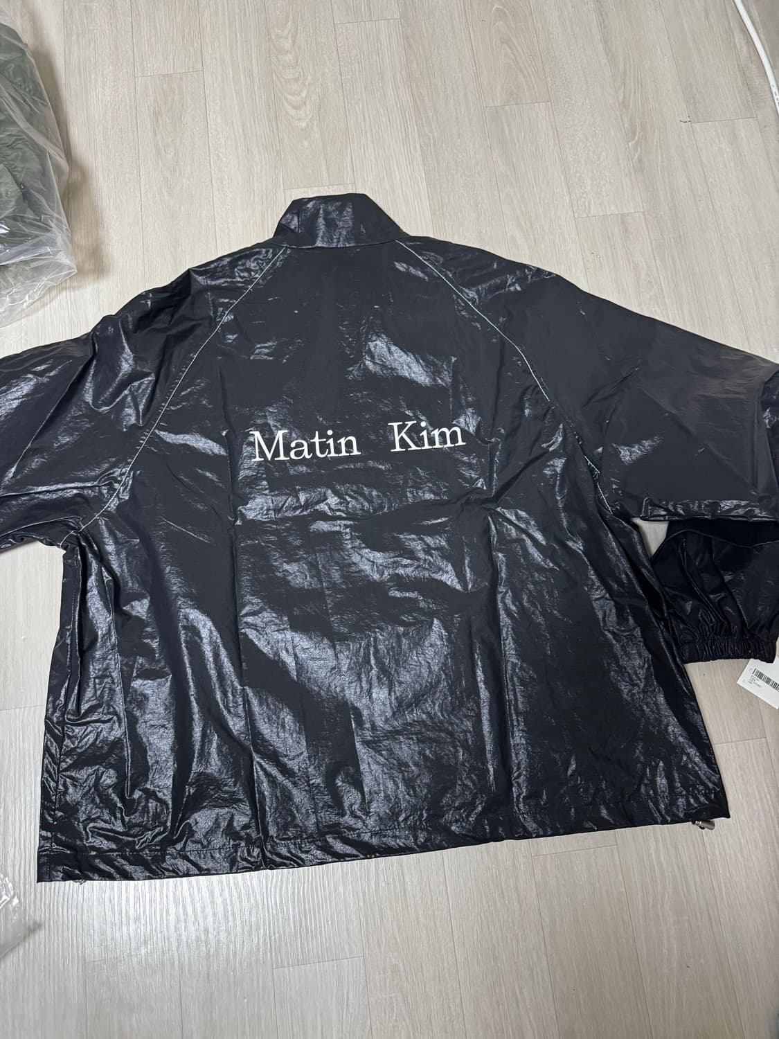 [Free] 마뗑킴 로고 코팅 점퍼 상품이미지1