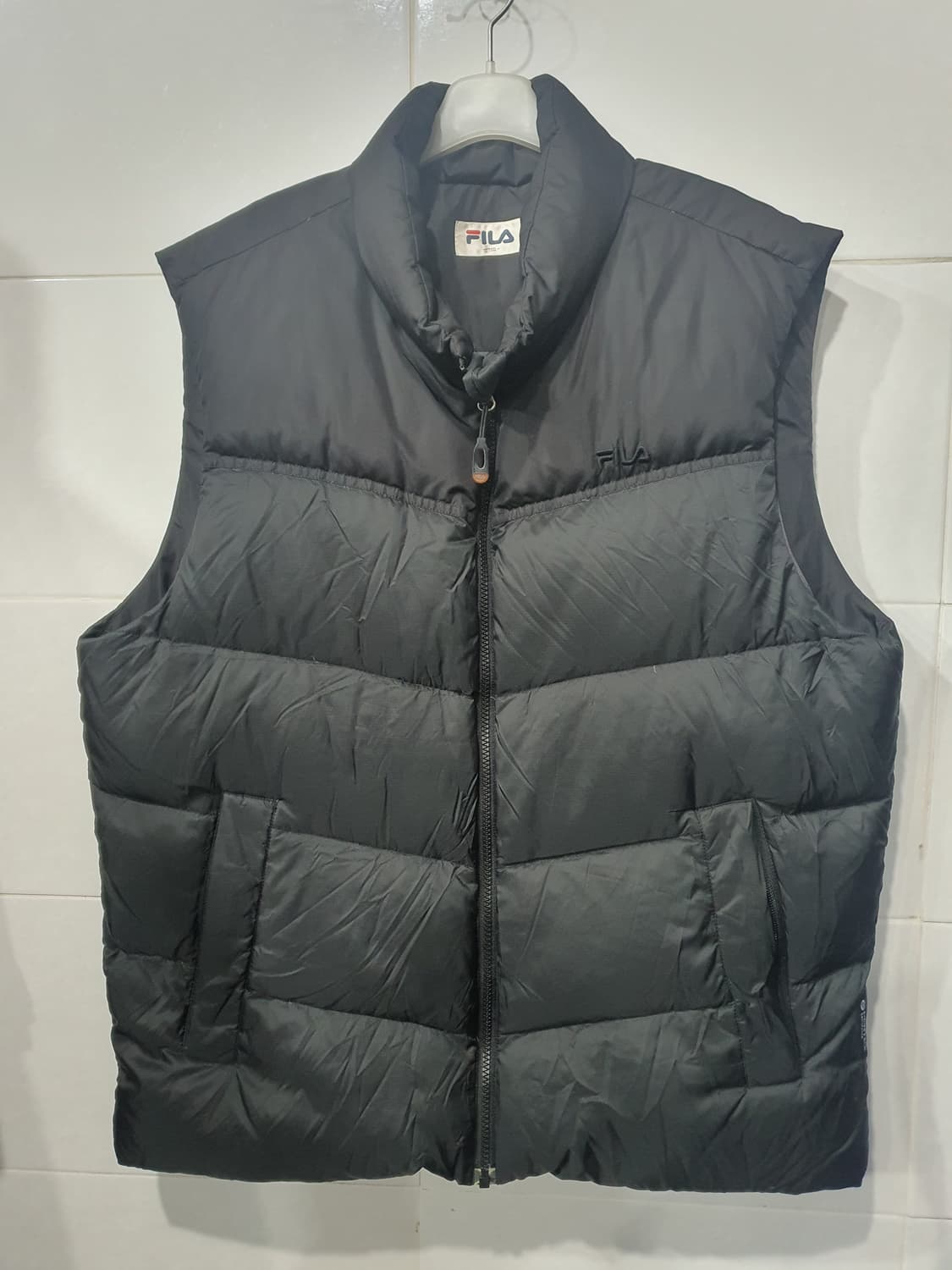FILA 검정 고스패딩 조끼 상품이미지1