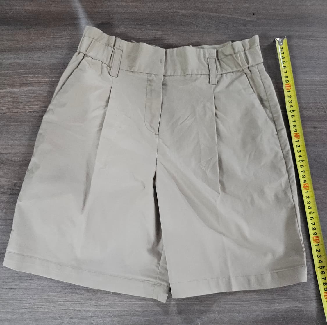 조이너스 얇은 베이지 플리츠 반바지 71 상품이미지1