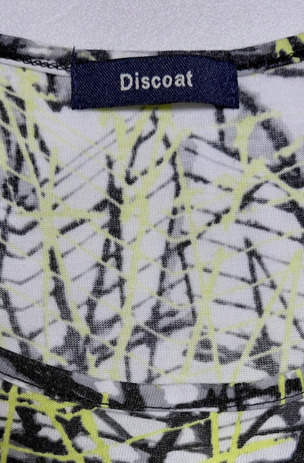 [F] Discoat 디스코트 네온 그래픽 슬리브리스 나시 탑 상품이미지6