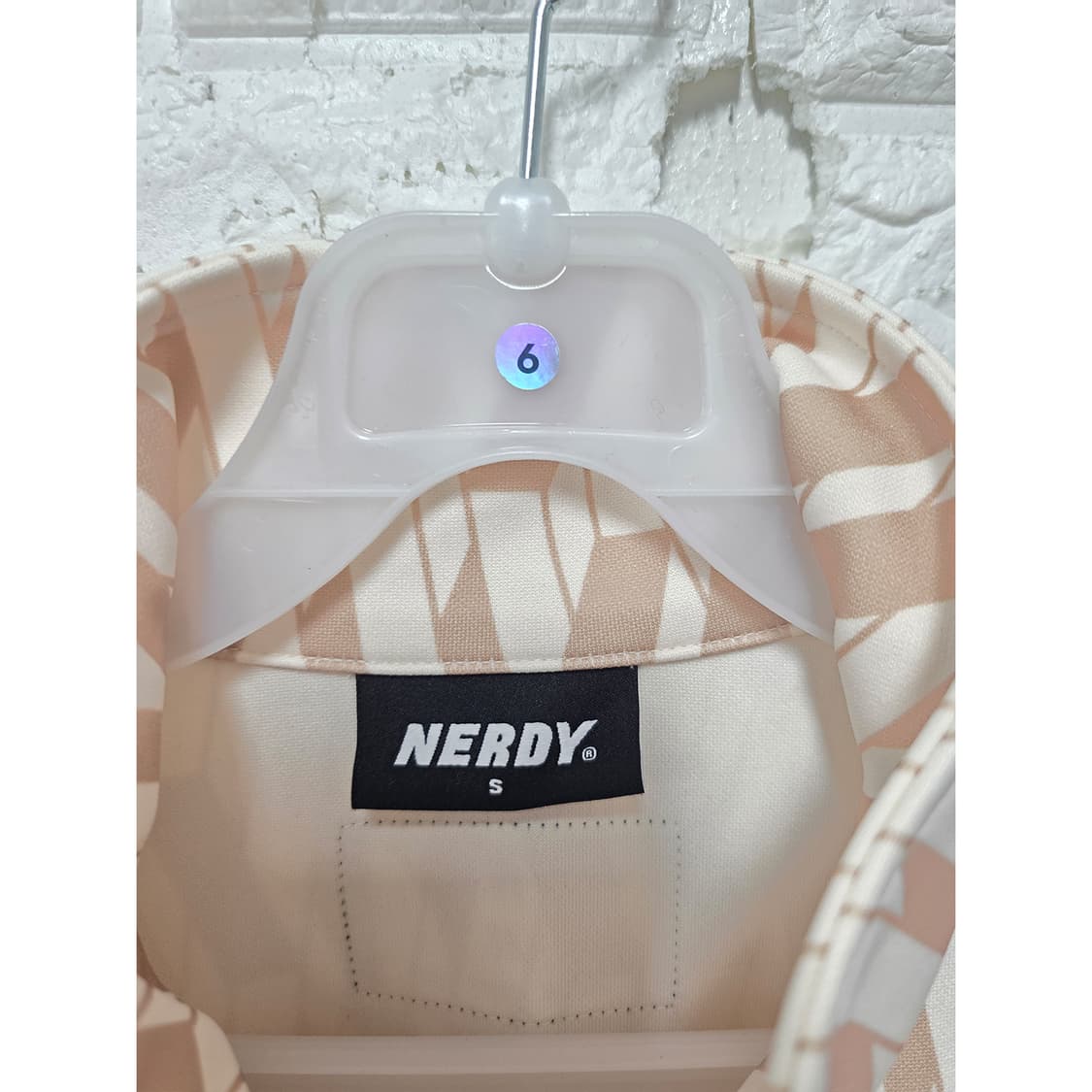 택포// 널디 심볼 패턴 트랙탑 L 크림 상품이미지2