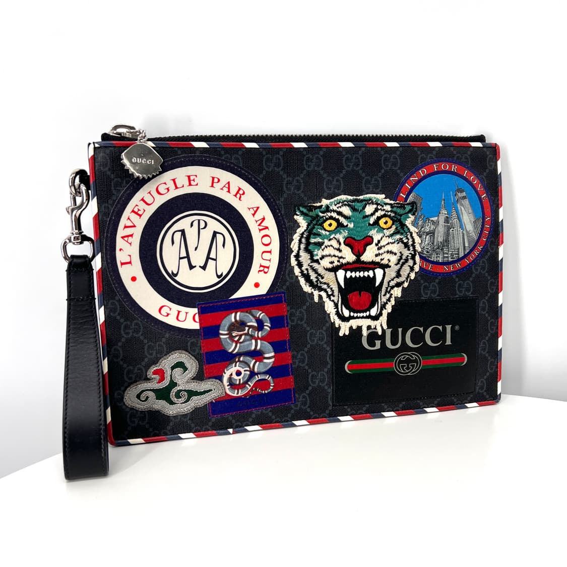 구찌 나이트 쿠리에 GG 수프림 클러치백 (496346) 상품이미지1