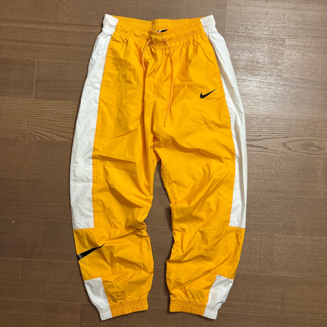 나이키 우브 트랙 조거 팬츠 옐로우 노랑 상품이미지1