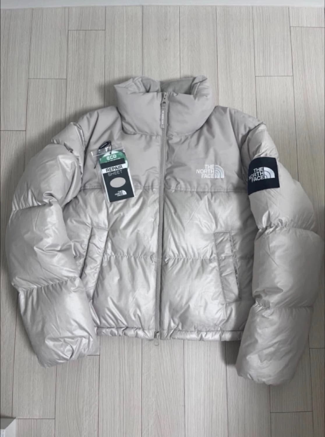 노스페이스 화이트라벨 눕시 다운 자켓 크림 베이지 상품이미지1
