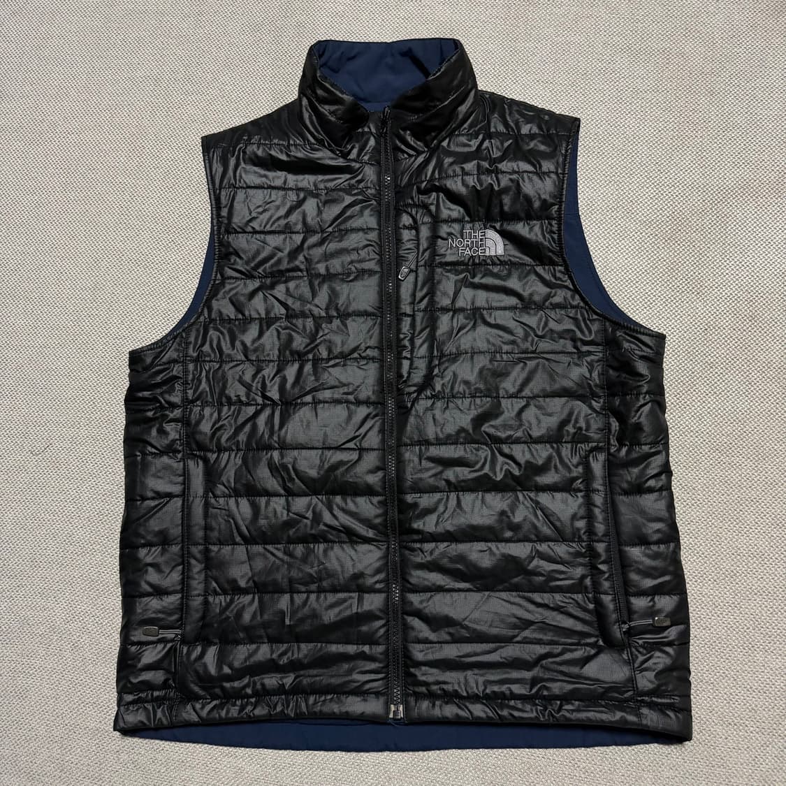 노스페이스 리버시블 경량 패딩조끼 상품이미지1