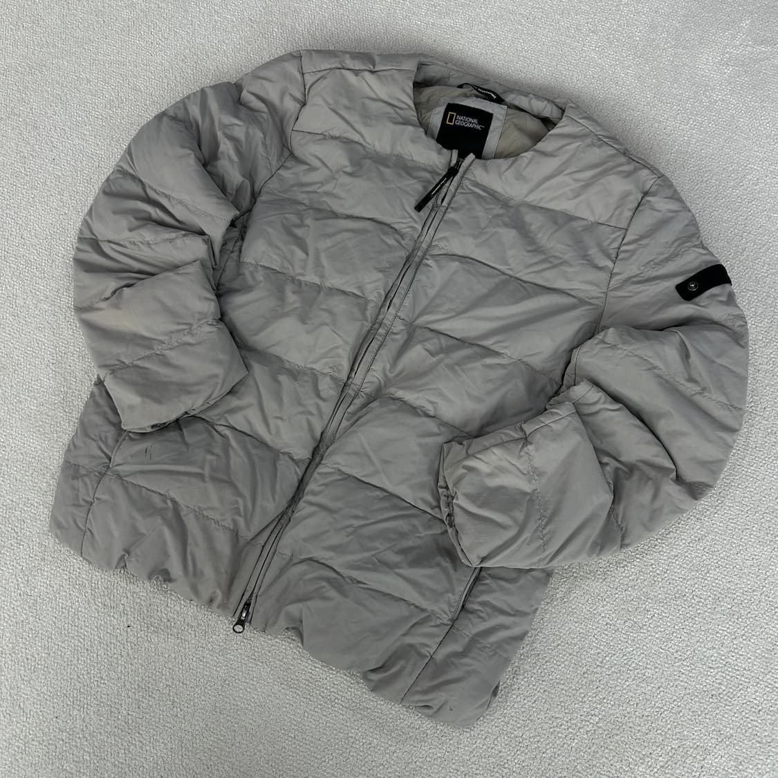 내셔널지오그래픽 패딩 자켓 회색 100 상품이미지1