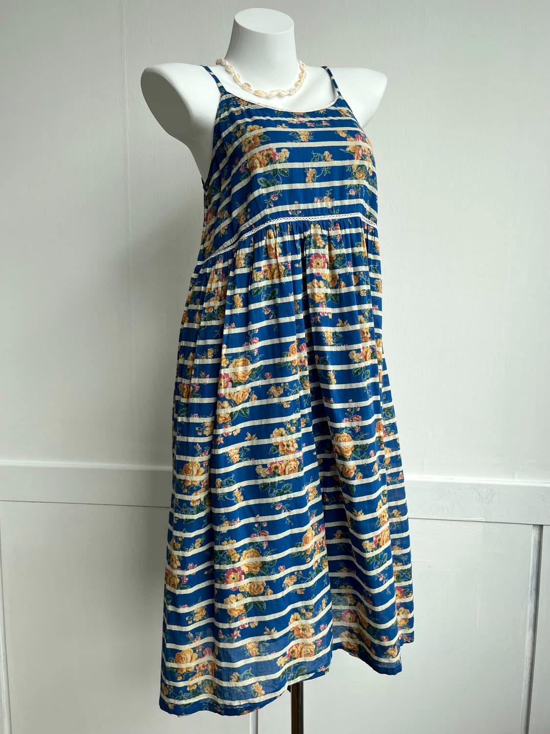 
스트라이프 플로럴 민소매 원피스 상품이미지1