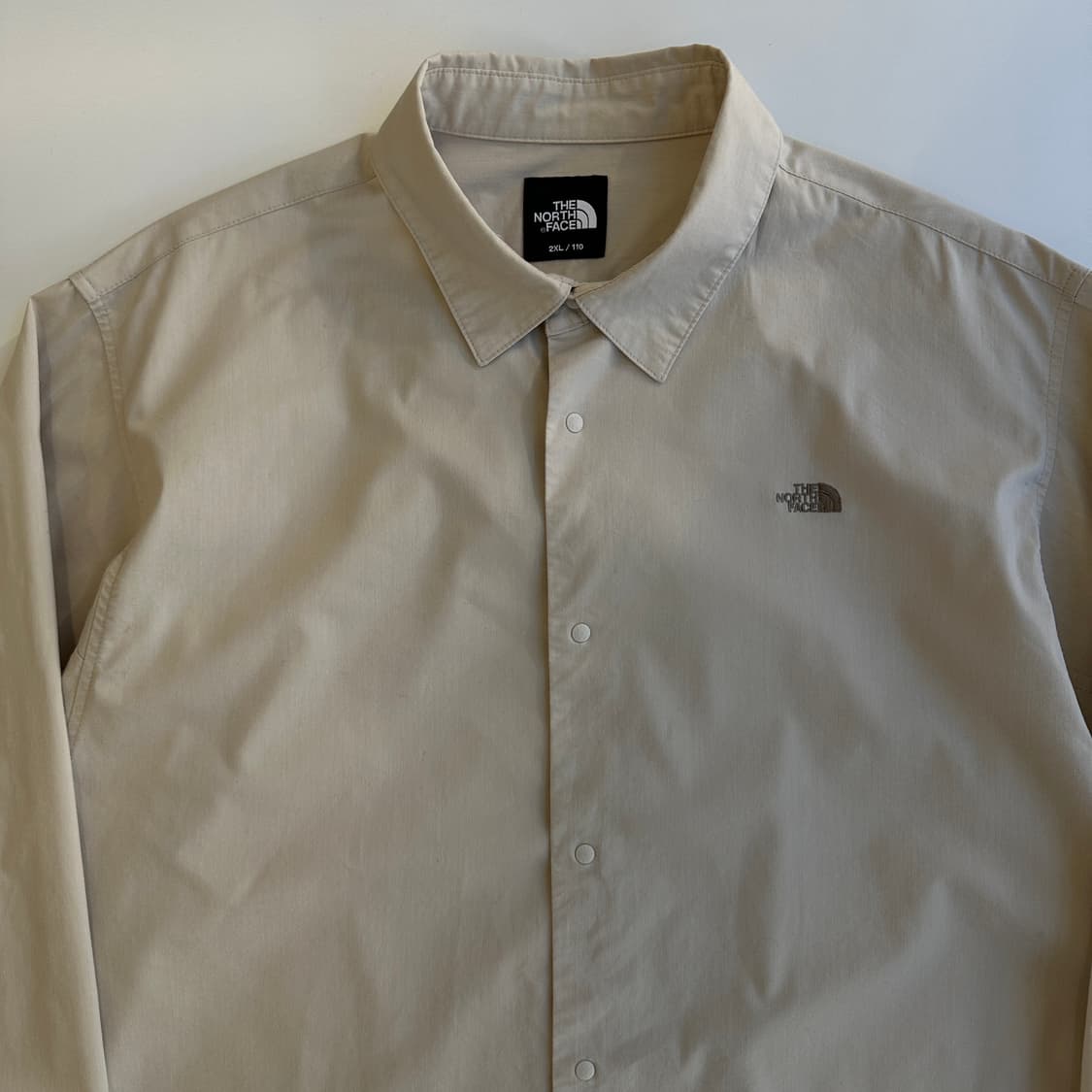 노스페이스 브라운베이지 나나미키 로고 버튼 셔츠 상품이미지2